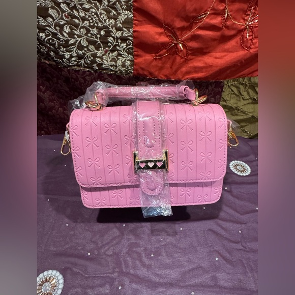 Betsey Johnson Handbags - Betsey Johnson’s Pink Bow Embossed Women's Handbag Removable Crossbody Strap 🩷